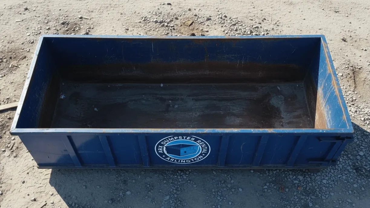 Foundation repair and concrete debris in Arlington, Texas — small container loaded flat with clay spoil and broken slab