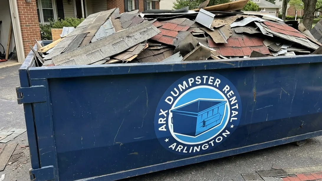 Roofing tear-off dumpster in Arlington, Texas — container sized by squares and layers for an asphalt shingle roof